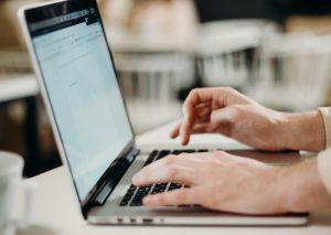 person using laptop