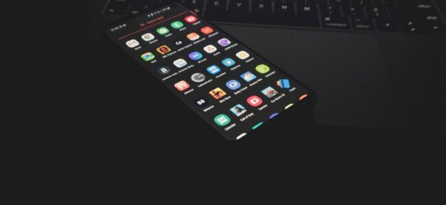 A picture containing electronics, indoor, keyboard, black Description automatically generated